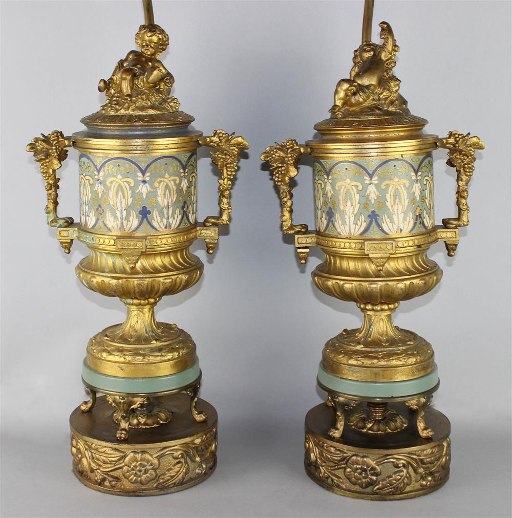 Appraisal: PAIR OF CONTINENTAL GILT-METAL AND CHAMPLEVE ENAMEL URN-FORM TABLE LAMPS