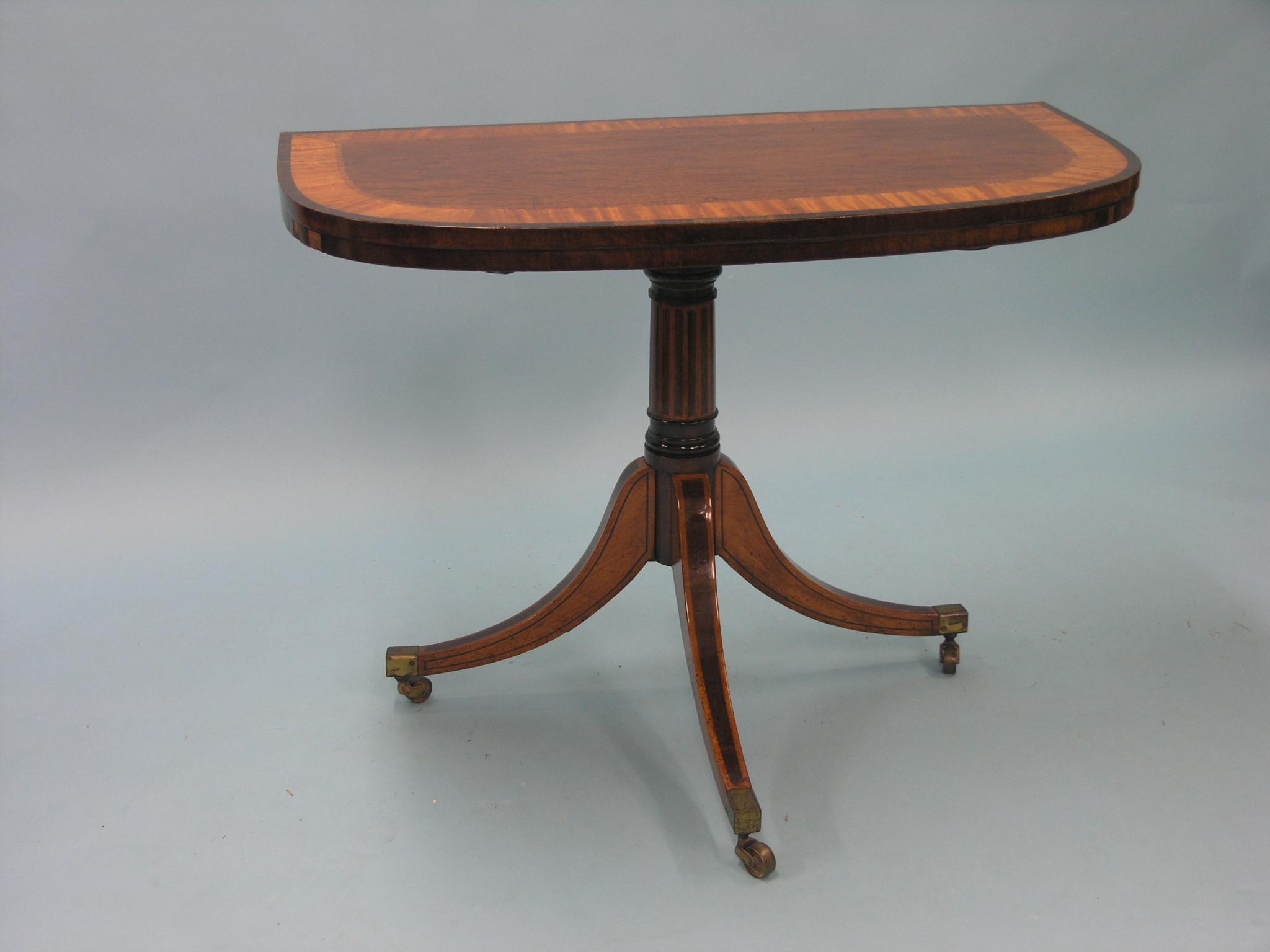 Appraisal: A George III mahogany card table with rare hinged leaf-support