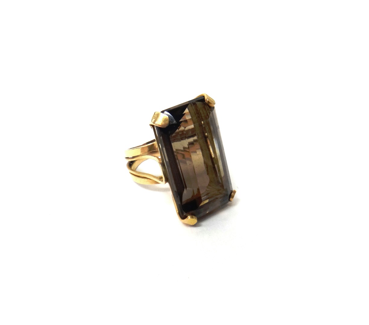 Appraisal: A Middle Eastern gold ring claw set with a rectangular