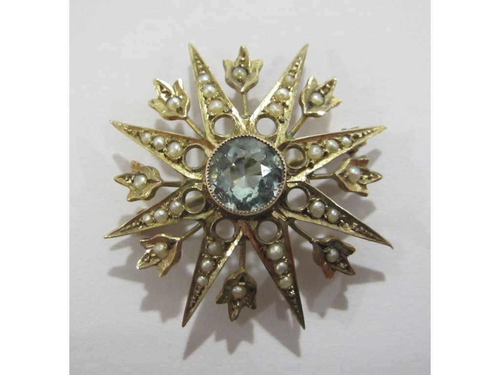 Appraisal: Edwardian ct gold aquamarine and seed pearl set star shaped