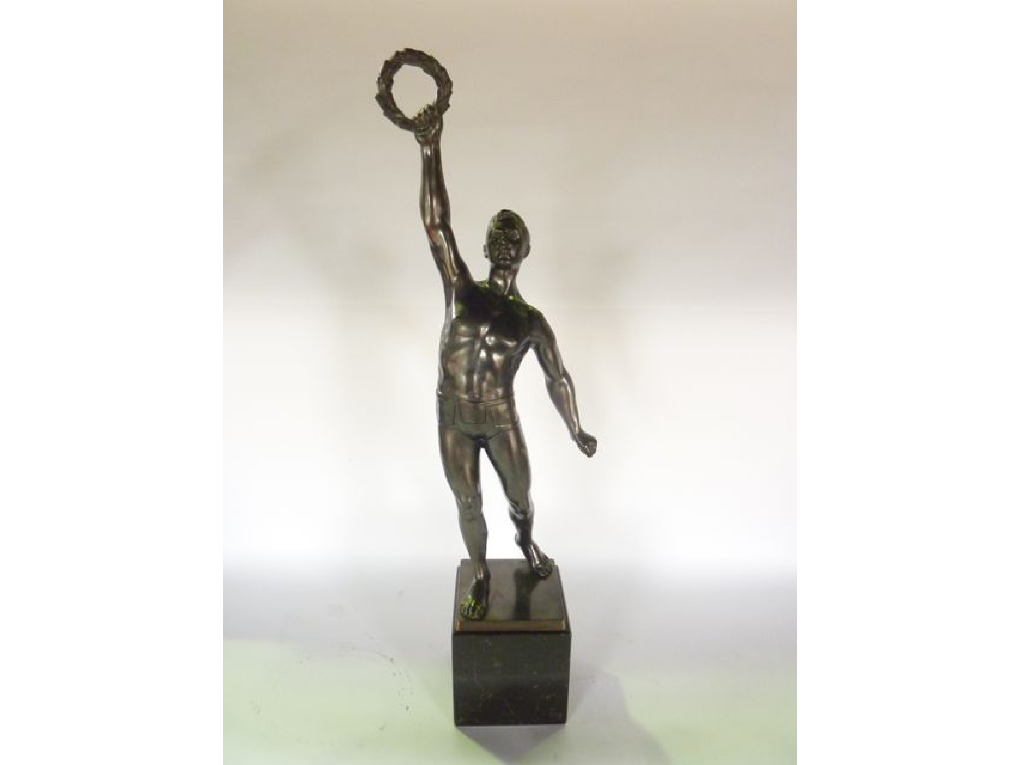 Appraisal: A cast metal sculptural study of a standing male naturalistically