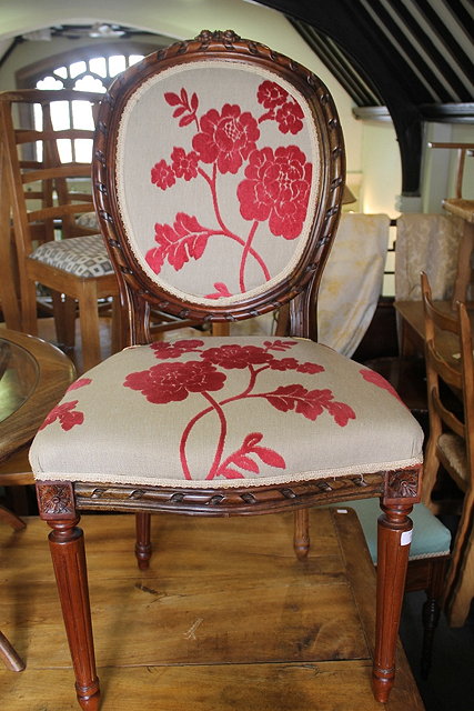 Appraisal: A REPRODUCTION FRENCH STAINED BEECHWOOD SIDE CHAIR with upholstered seat