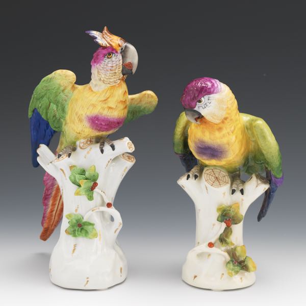 Appraisal: TWO GERMAN PORCELAIN BIRDS One cockatoo fluffing its wings on