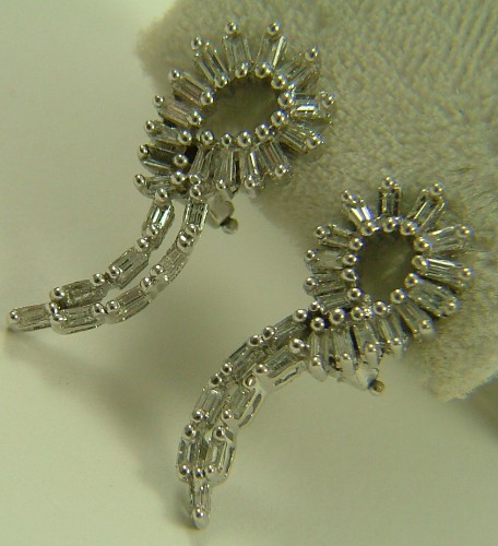 Appraisal: PAIR OF DIAMOND AND FOURTEEN KARAT GOLD EARRINGS each white