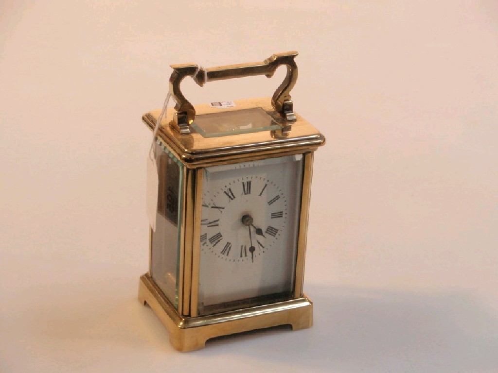 Appraisal: A Victorian gilt metal carriage clock with timepiece movement white