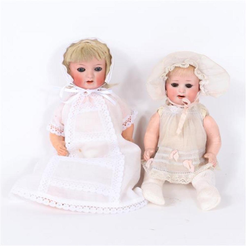 Appraisal: TWO GERMAN BISQUE SOCKET HEAD CHARACTER BABY DOLLS HEUBACH KOPPELSDORF