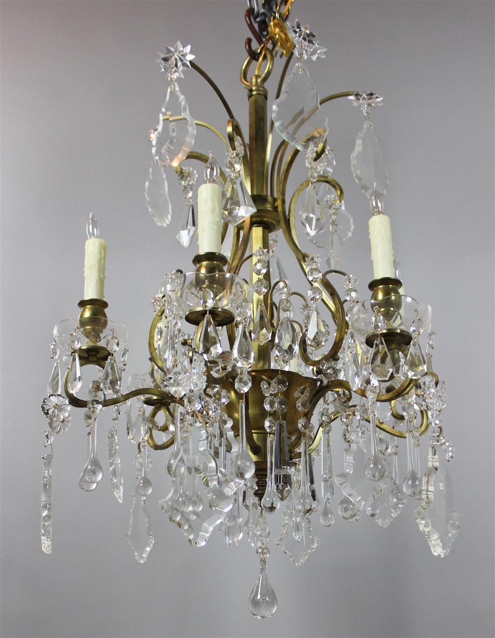 Appraisal: CLASSICAL STYLE GILT BRASS AND CRYSTAL SIX LIGHT CHANDELIER h