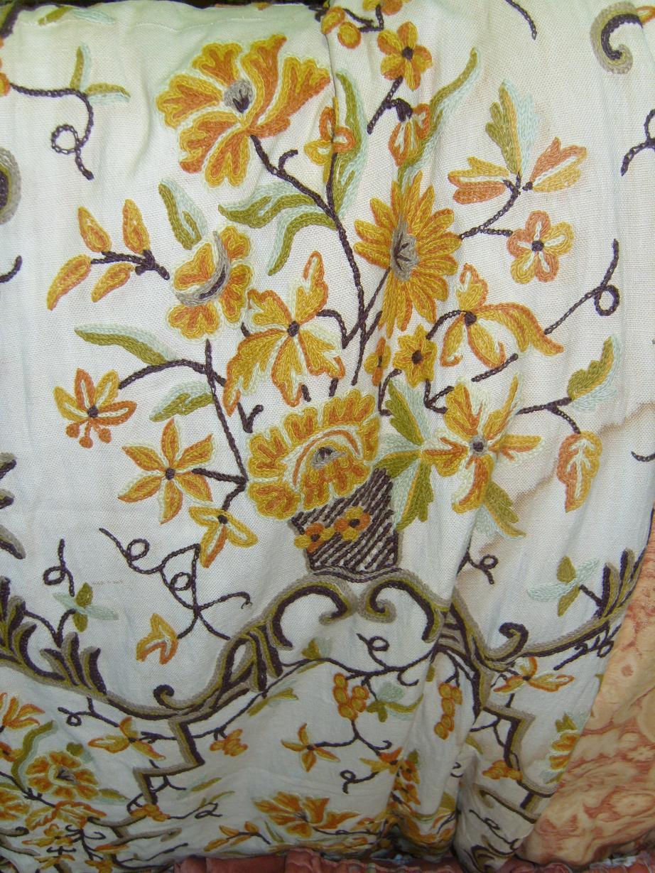 Appraisal: A pair of crewel work curtains with orange and brown