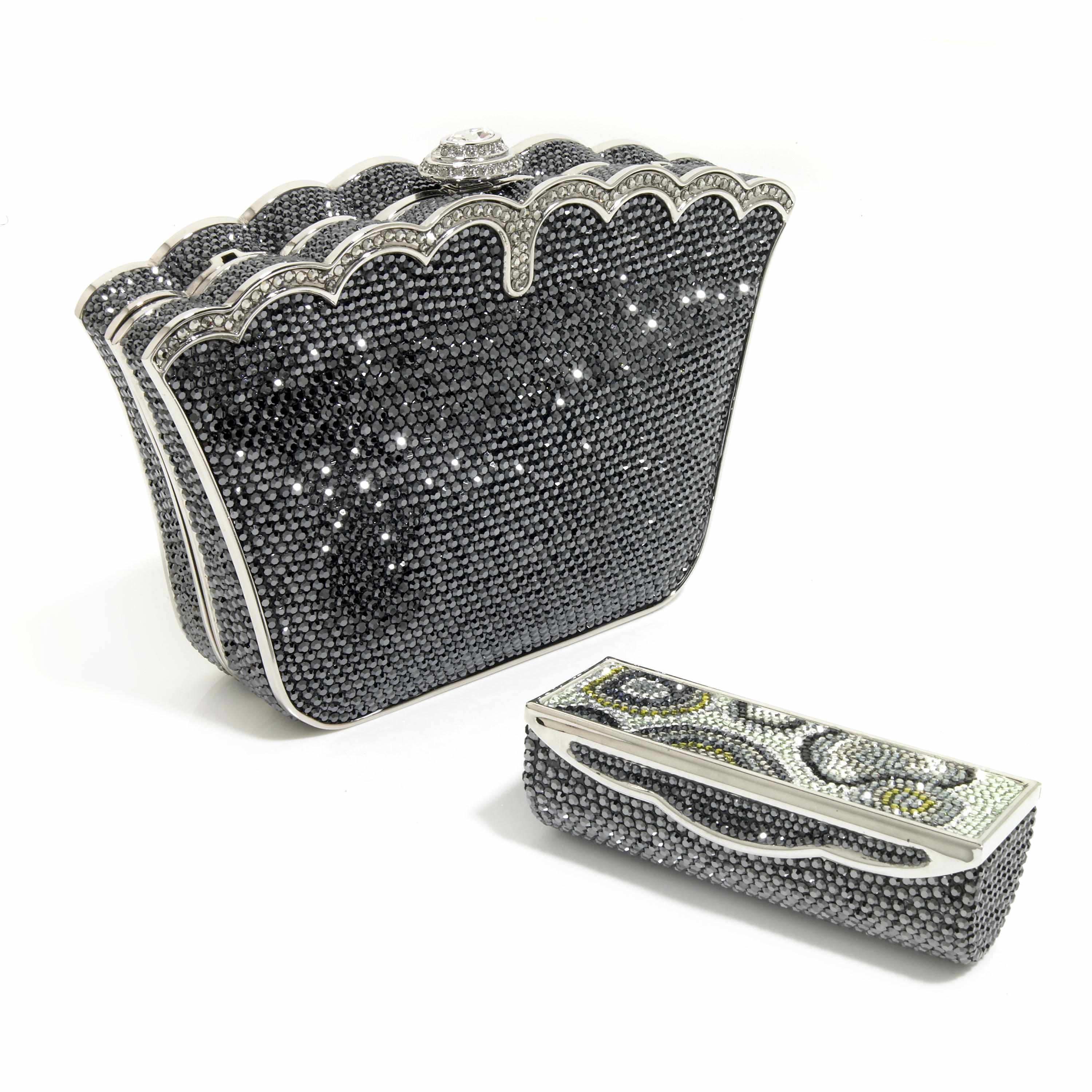 Appraisal: A dark grey and silver crystal purse with scalloped edges