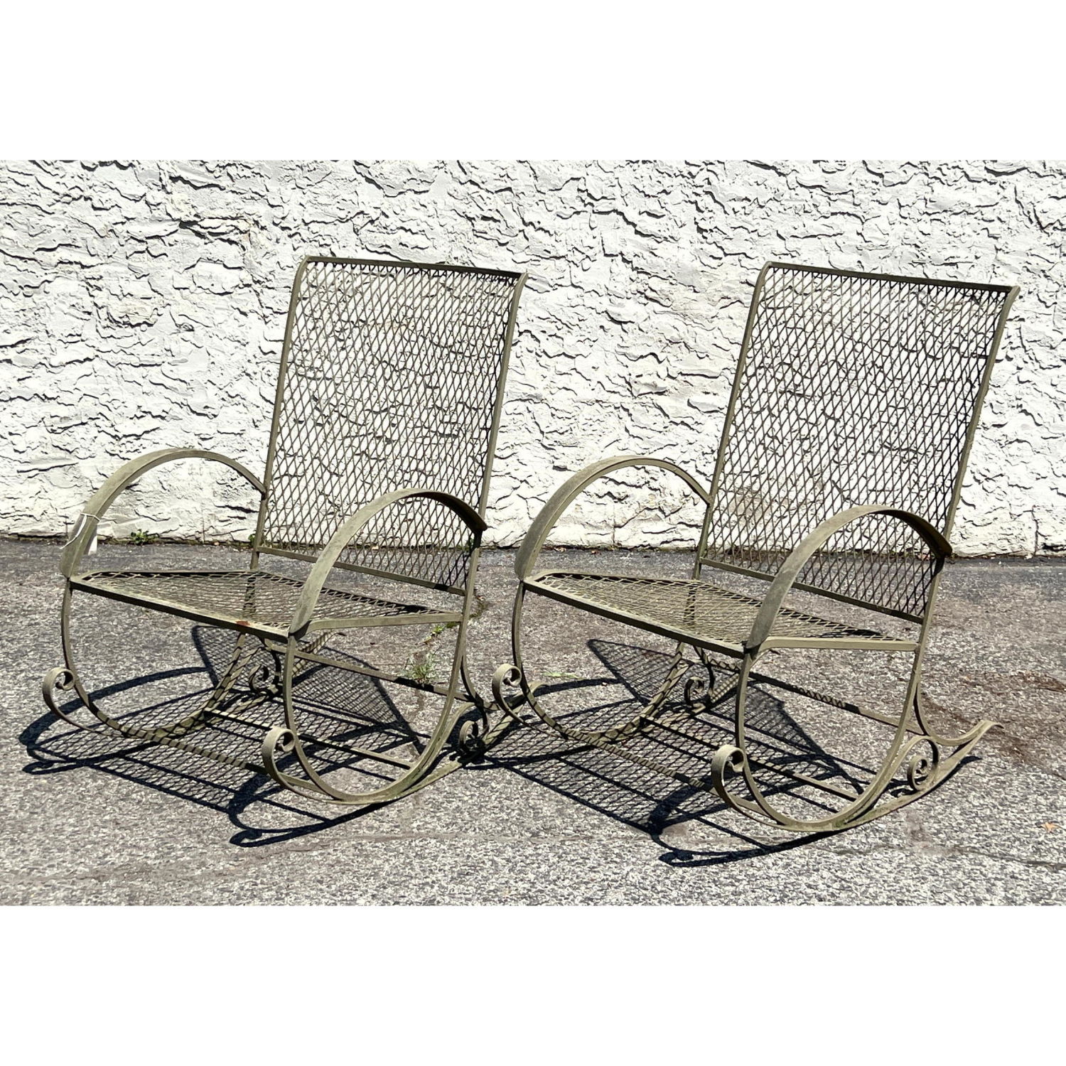 Appraisal: Pr Iron Mesh Metal Outdoor Lounge Chairs Diamond mesh forms