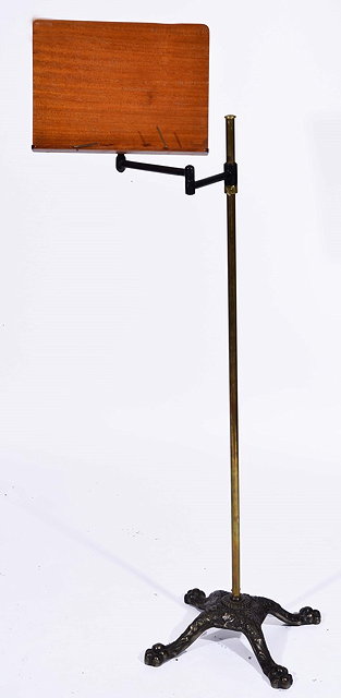 Appraisal: A LATE VICTORIAN MAHOGANY MUSIC STAND height adjustable brass column