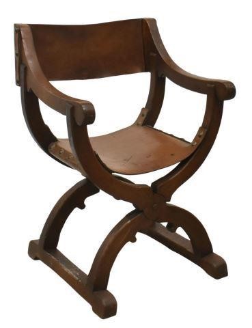 Appraisal: French Dagobert style oak armchair late th c having leather