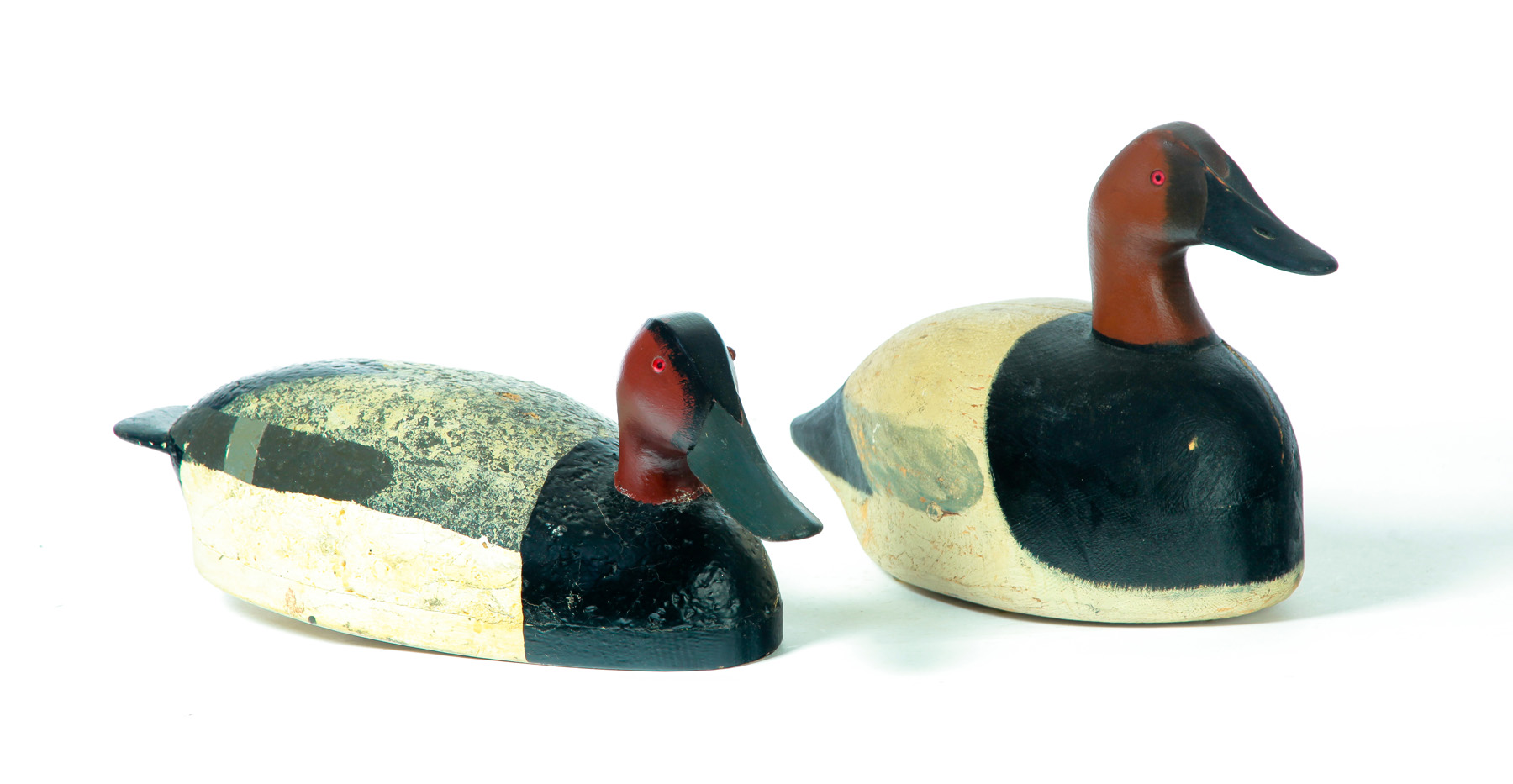 Appraisal: TWO AMERICAN DUCK DECOYS Second quarter- th century Oversize canvasbacks