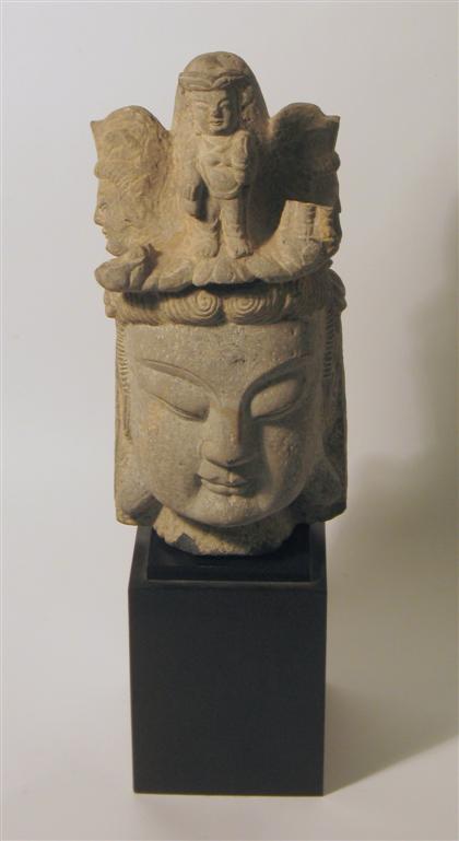 Appraisal: Chinese stone carved head of Bodhisattva Single section carving light