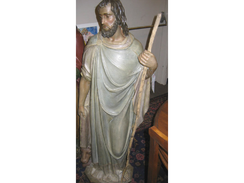 Appraisal: CARVED WOODEN RELIGIOUS FIGURE St Luke with staff and winged