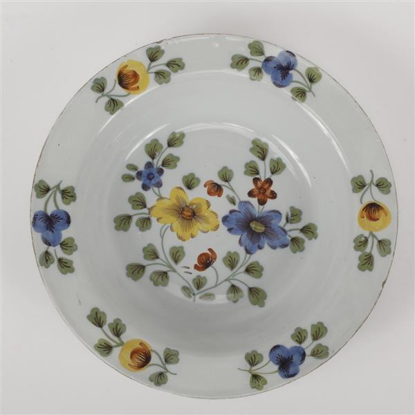 Appraisal: English polychrome porcelain bowl with hand painted flowers circa Large