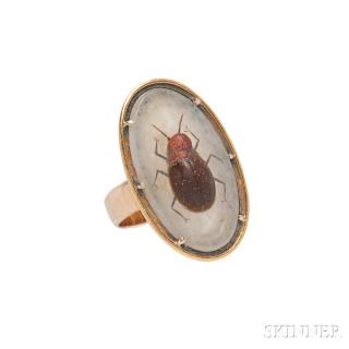 Appraisal: kt Gold and Hardstone Ring centering a goldstone beetle against