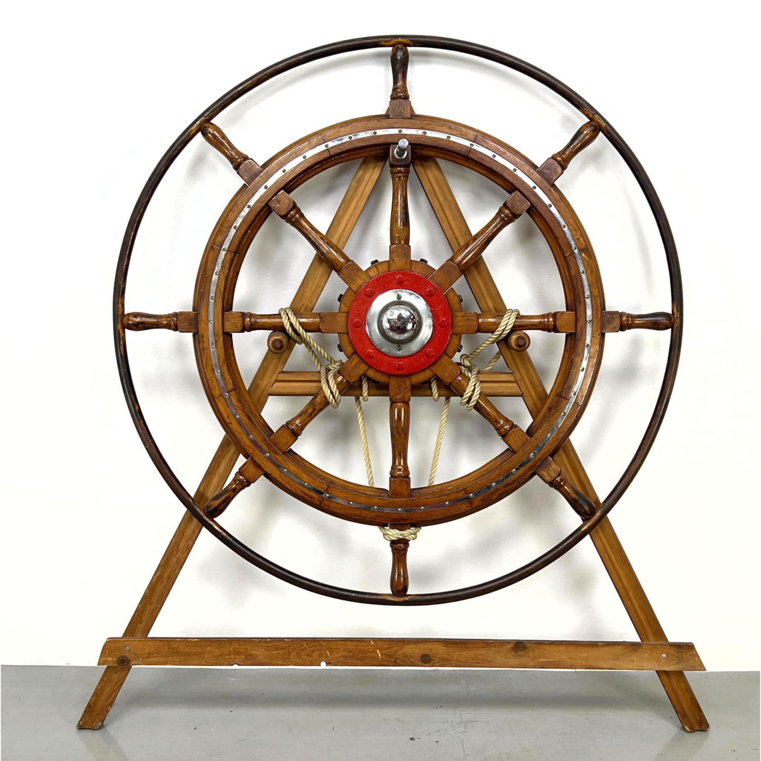 Appraisal: Large Antique Ship's Wheel In custom display easel Marine Industrial