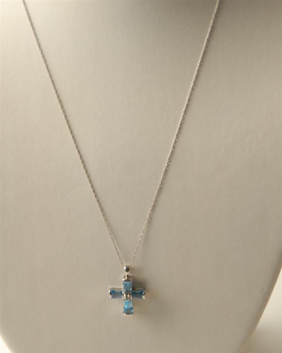 Appraisal: A Gold Blue Tourmaline and Diamond Cross Pendant K marked