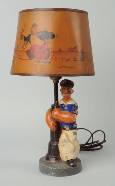 Appraisal: Cast Metal Popeye Lamp with Matching Shade This Popeye lamp