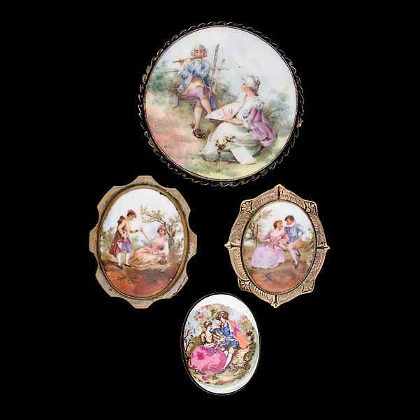 Appraisal: Porcelain Painted Scene brooch collection A grouping of four painted