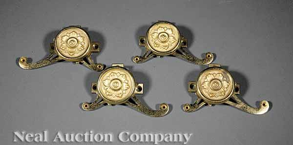 Appraisal: A Set of Four Victorian Gilt Brass Roundel Parlour Levers