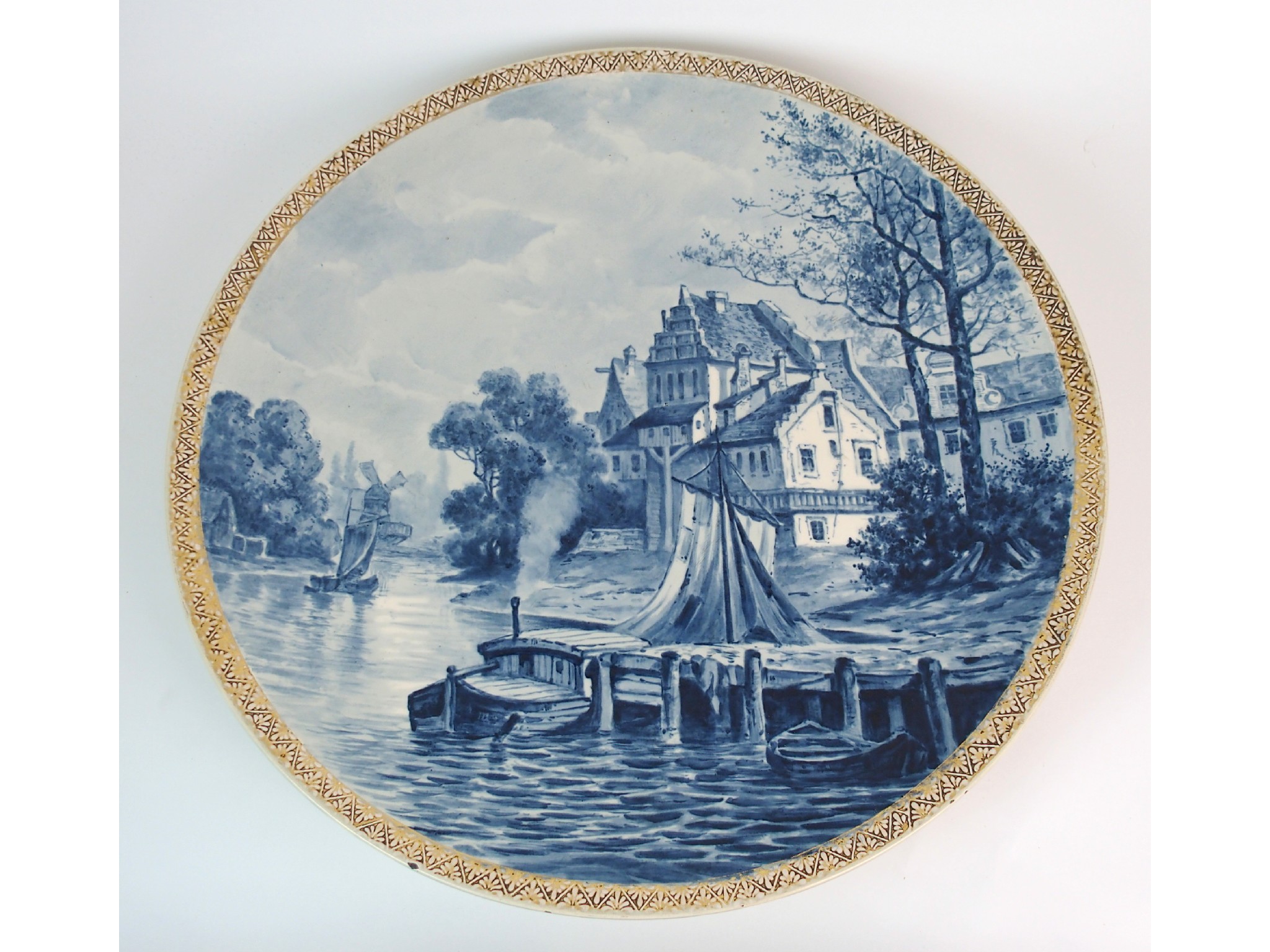 Appraisal: A large Dutch Delft blue and white porcelain plaqueround plaque