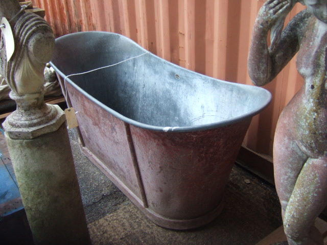 Appraisal: A zinc double ended bath the outside with painted faux