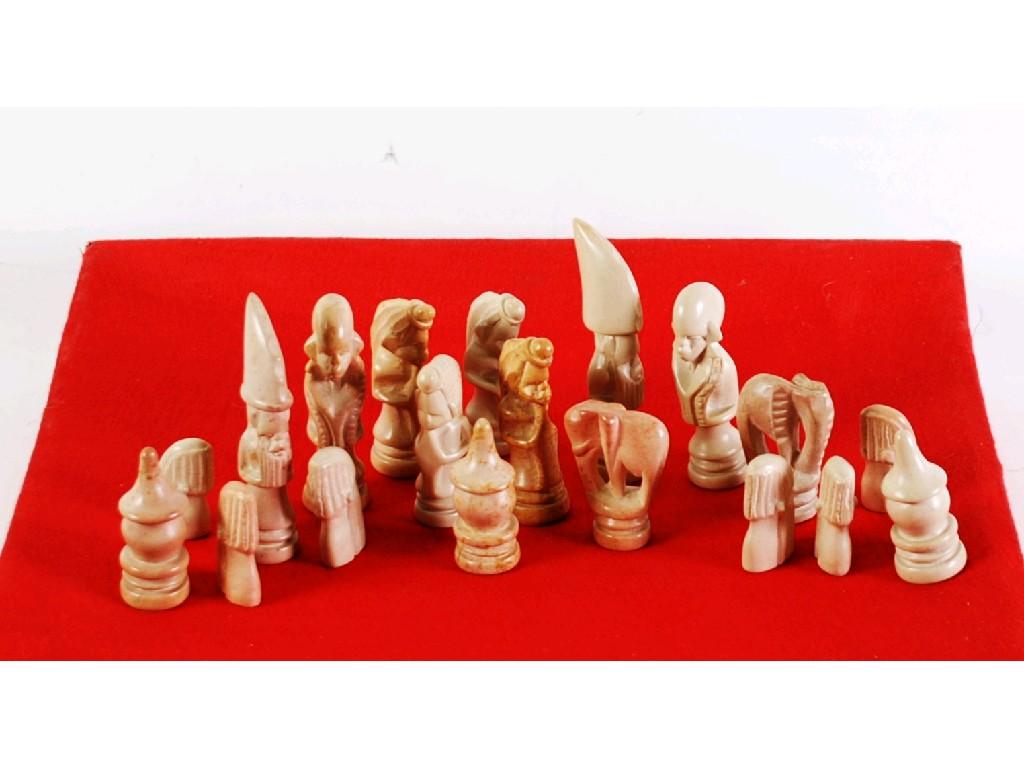 Appraisal: PROBABLY AFRICAN CARVED HARDSTONE CHESS SET and the HARDSTONE INLAID