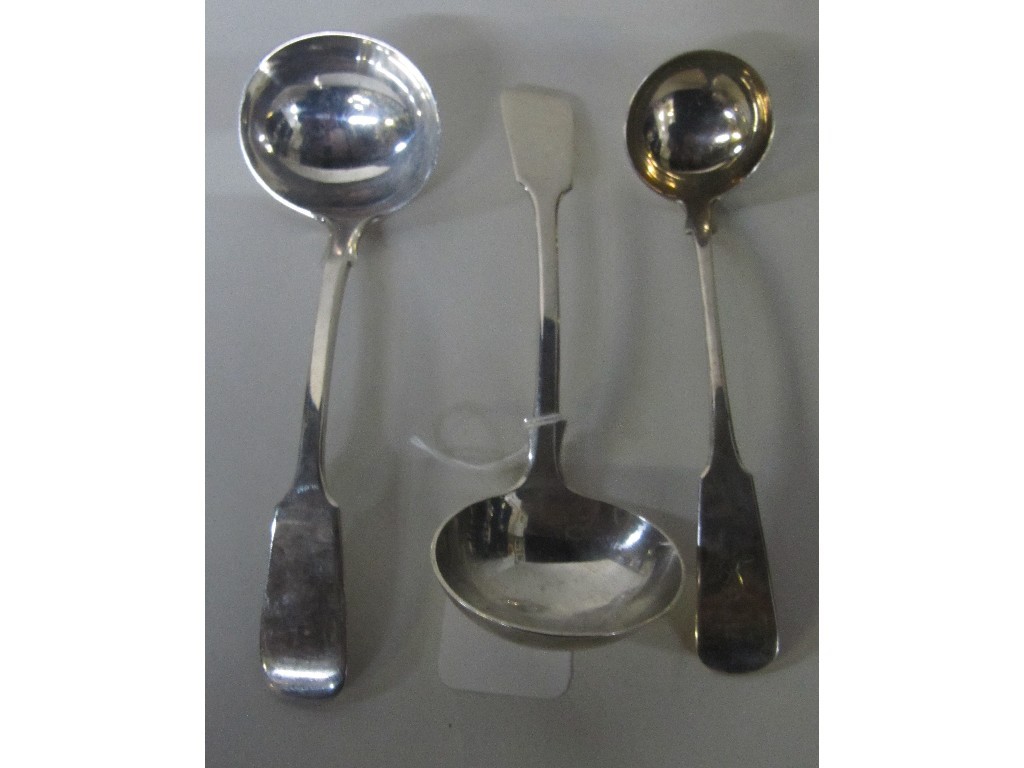 Appraisal: Lot comprising pair of silver sauce ladles London and a