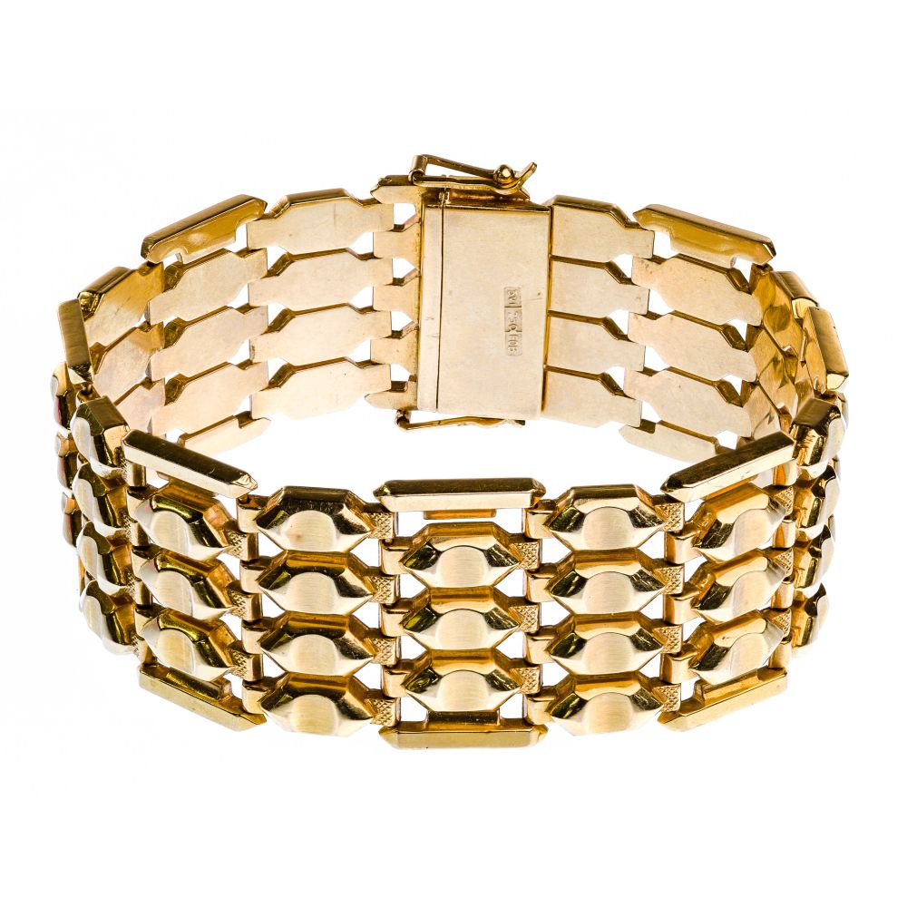 Appraisal: K YELLOW GOLD TEXTURED BRACELETMulti-textured having rows of articulated geometric