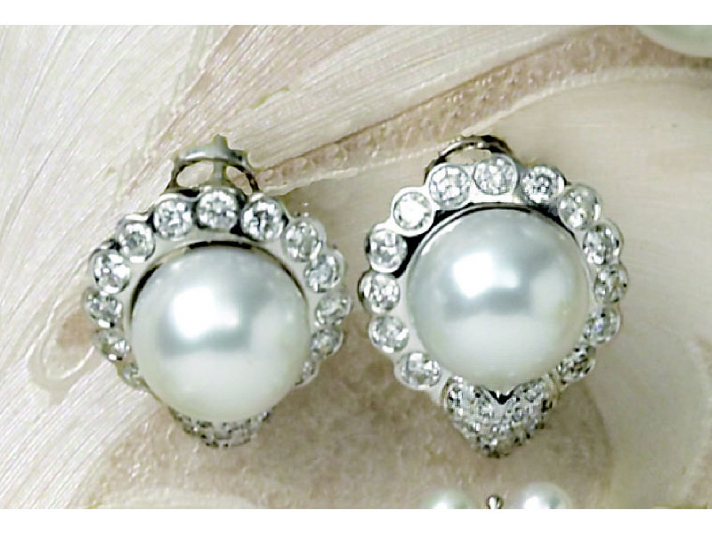 Appraisal: SOUTH SEA PEARL AND DIAMOND EARRINGS k white gold pierced