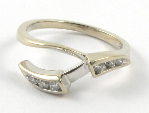 Appraisal: DIAMOND AND FOURTEEN KARAT GOLD RING GUARD set with six