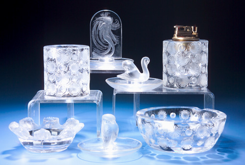 Appraisal: LALIQUE Seven items six ashtrays and a table lighter all