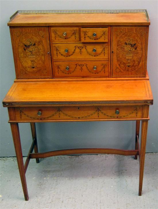 Appraisal: Early th century satinwood boxwood strung and parquetry inlaid ladies