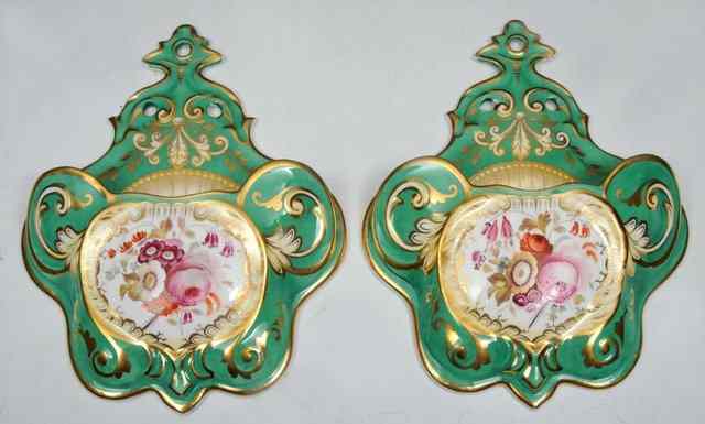 Appraisal: A PAIR OF ENGLISH GREEN PORCELAIN WALL POCKETS possibly Coalport