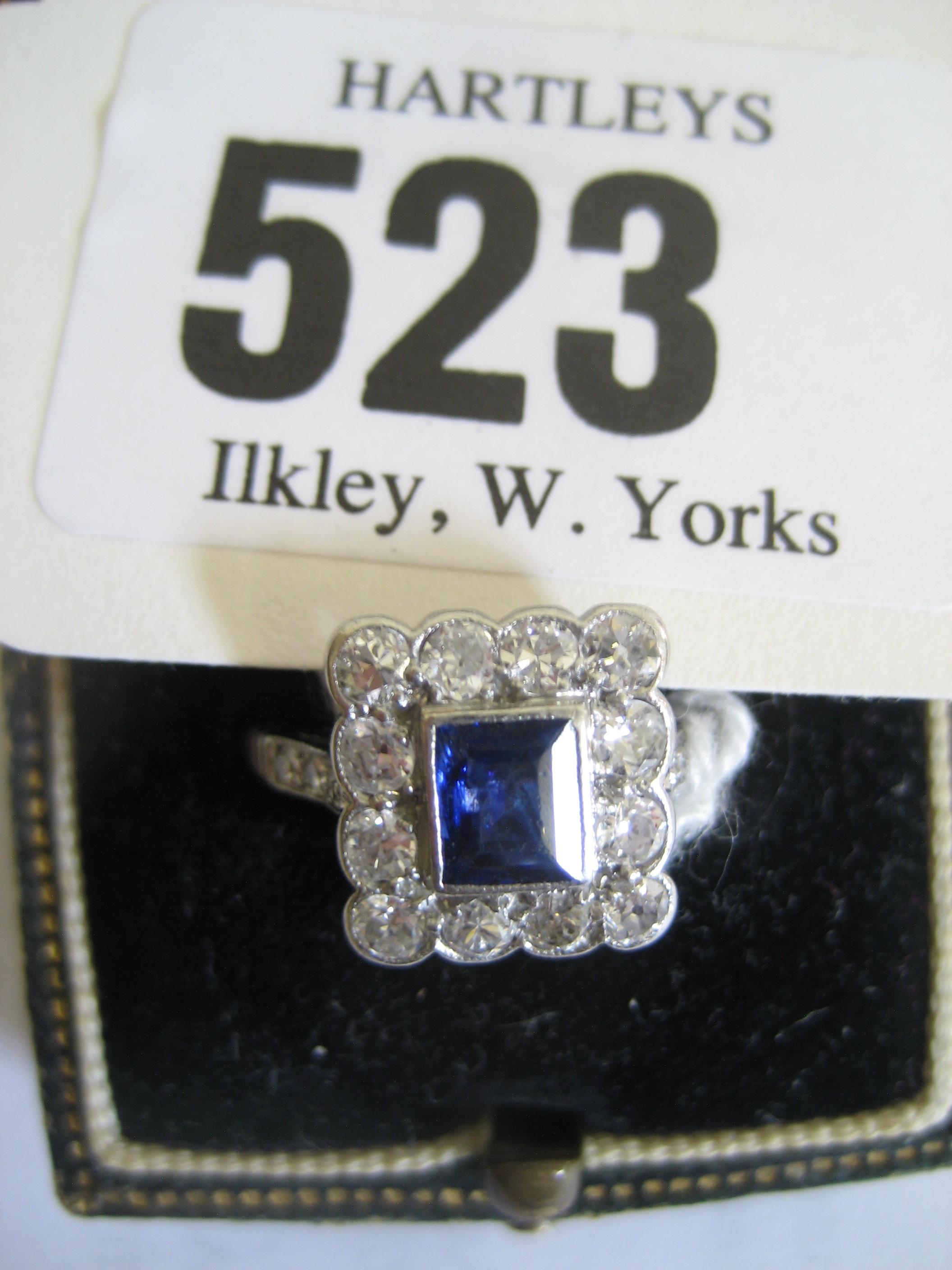 Appraisal: A SAPPHIRE AND DIAMOND SQUARE CLUSTER RING the princess cut