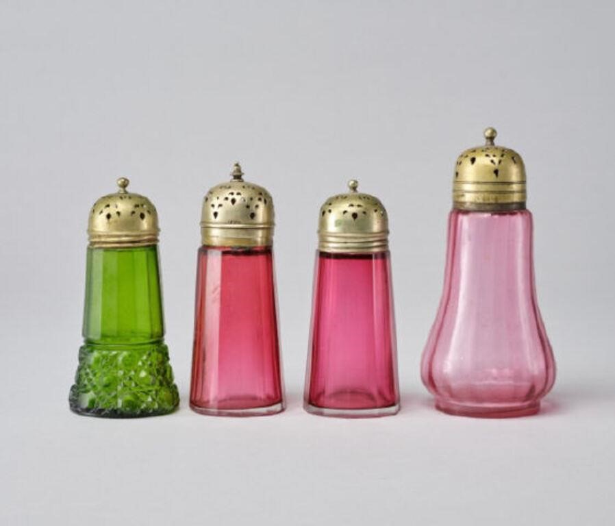 Appraisal: VICTORIAN SUGAR CASTERSA lot of four Victorian glass muffineers or