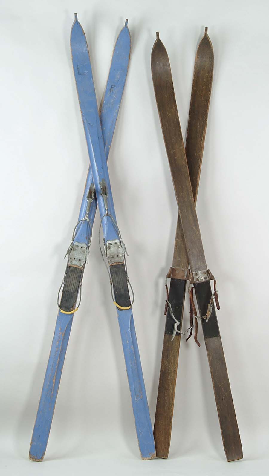 Appraisal: TWO PAIR OF EARLY WOOD SKIS One painted blue other