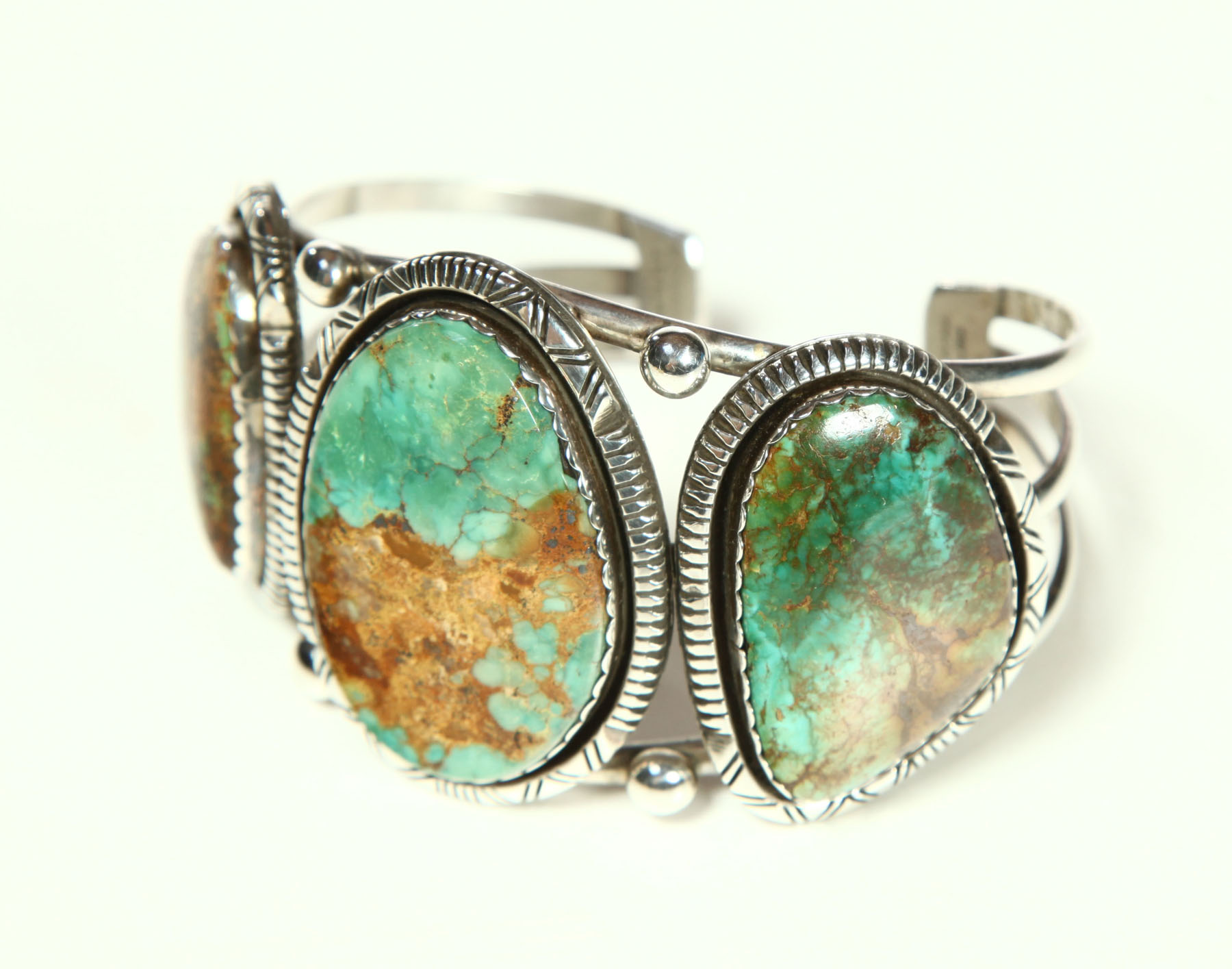 Appraisal: NAVAJO BRACELET Late th century Silver bracelet with three Emerald