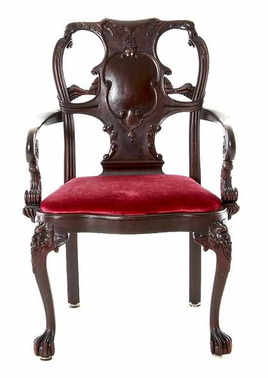 Appraisal: Chippendale style carved mahogany armchair early th century shaped crestrail