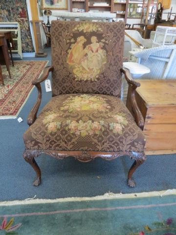 Appraisal: Carved Art Chair floral courting scene th century