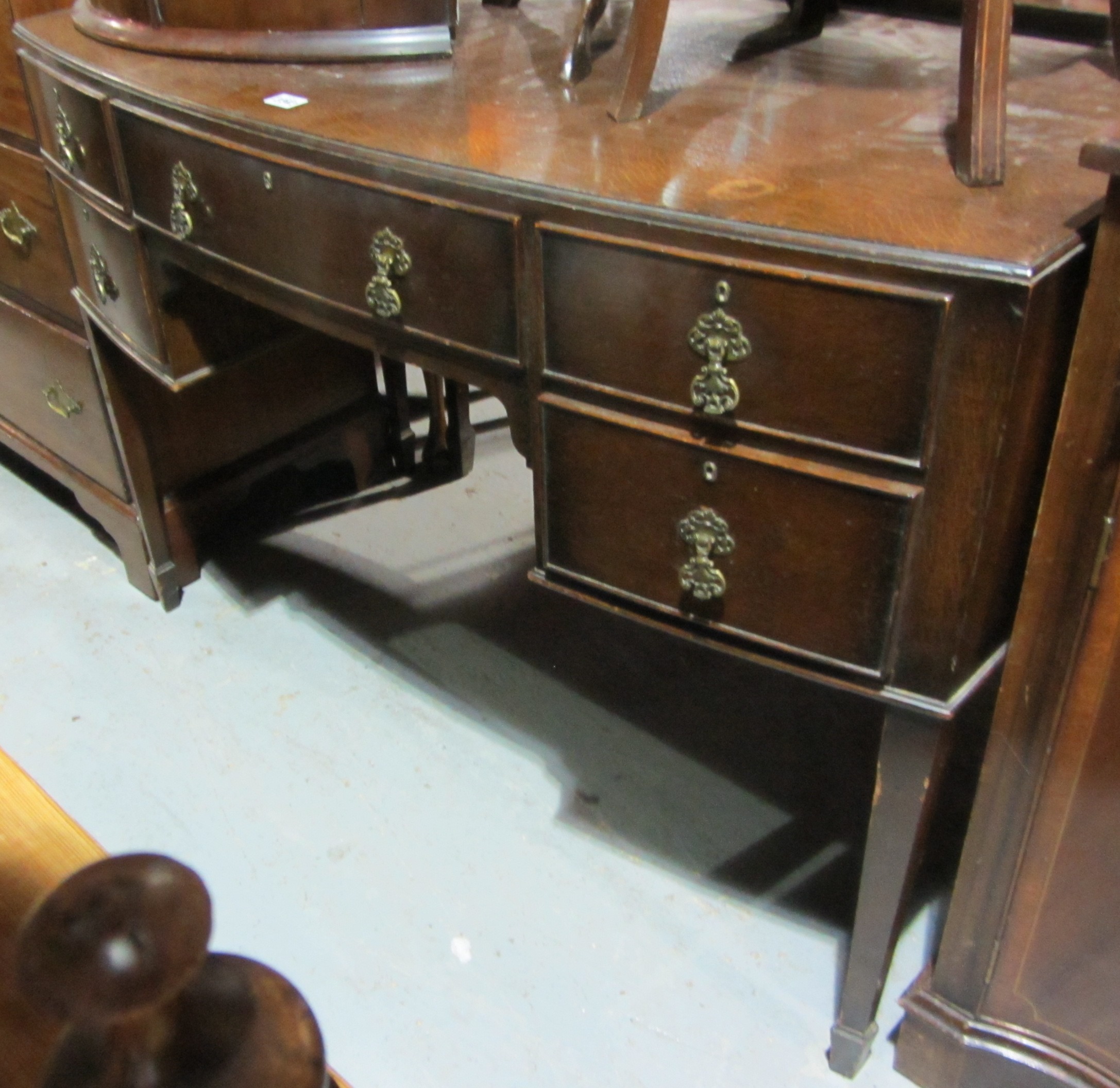 Appraisal: A th century oak bowfront sideboard