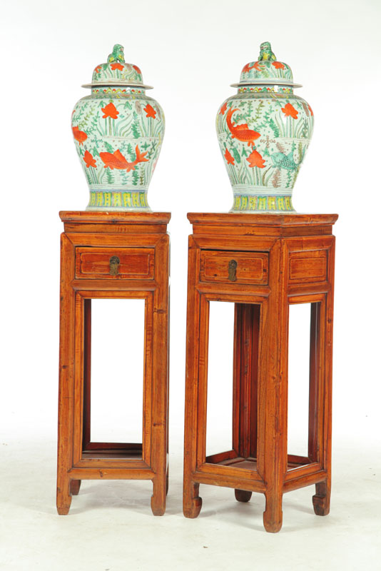 Appraisal: PAIR OF JARS AND WOODEN PEDESTALS China th century Two