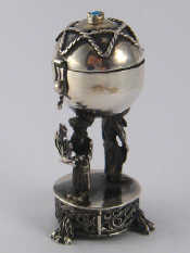 Appraisal: Judaica A silver spice container the container globe supported by