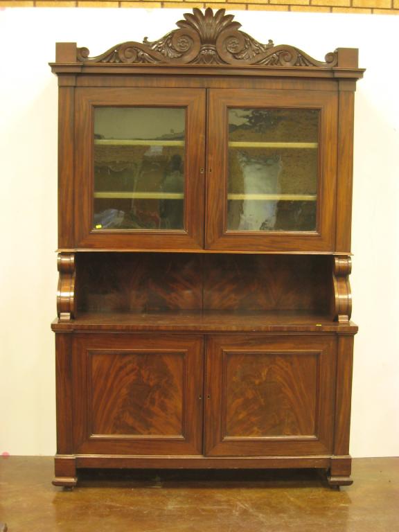 Appraisal: A William IV mahogany Bookcase with rosette scroll and leafage