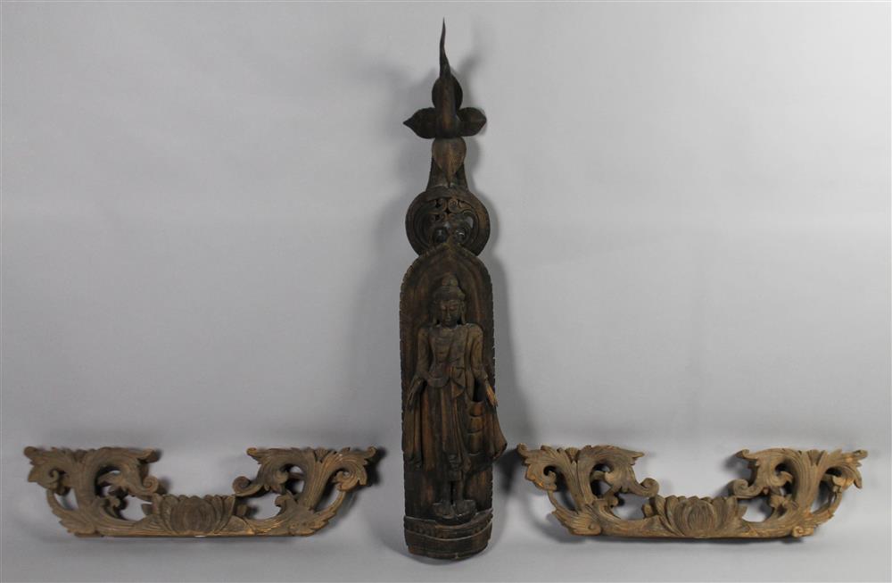 Appraisal: CARVED WALL ABHAYAMDRA BUDDHA TOGETHER WITH A PAIR OF FOLIATE