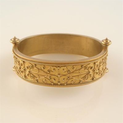 Appraisal: A th century ct gold Etruscan revival hinged bangle with