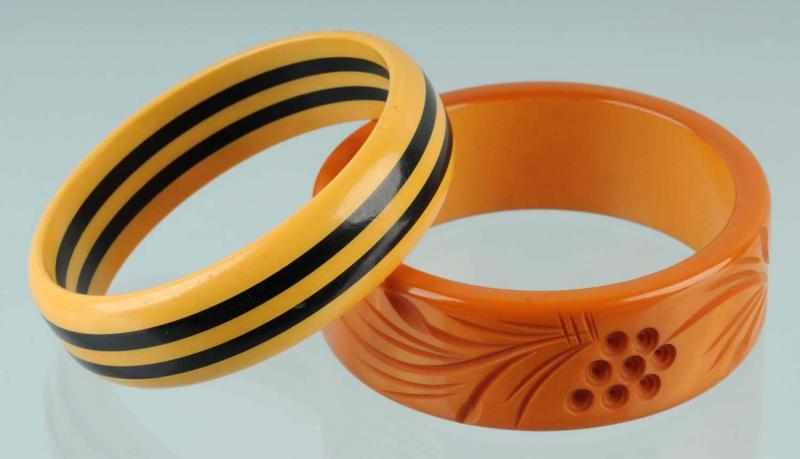 Appraisal: Lot of Bakelite Bracelets Description Includes one laminated and one