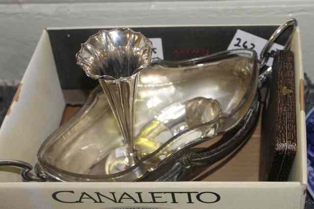 Appraisal: A SILVER PLATED PLANTER of boat shaped form with stylised